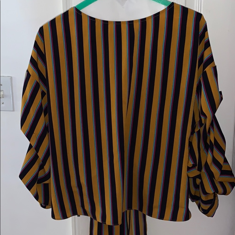 Stunning ruffed wrap blouse